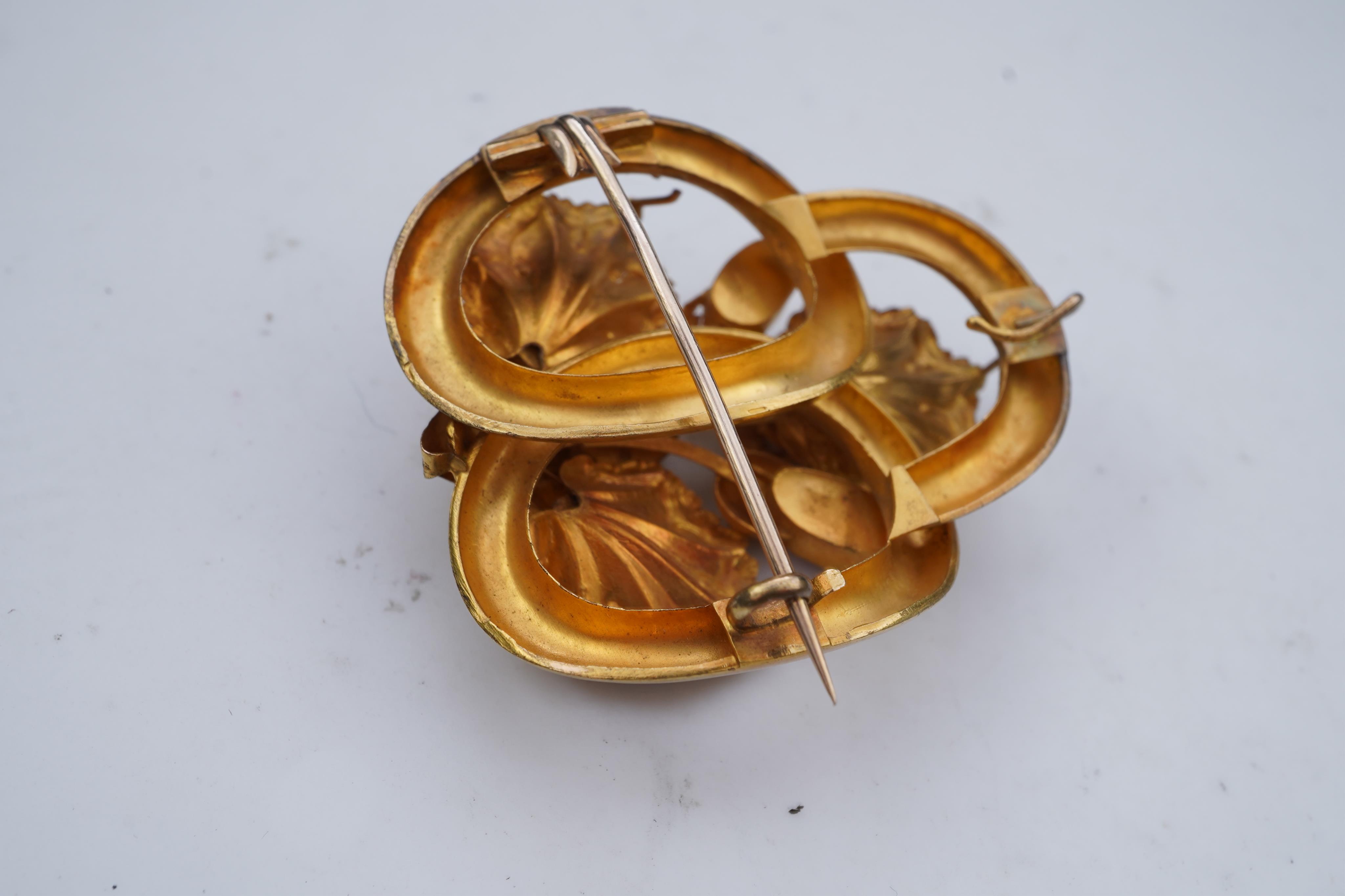 A gold and pink topaz brooch, mid 19th century